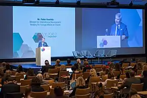 Pekka Haavisto, speaking at a podium