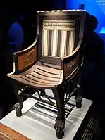 Ancient Egyptian armchair of Tutankhamun; 1336-1326 BC; wood, ebony, ivory and gold leaf; height: 71&nbsp;cm; Exposition of Tutankhamun Treasure in Paris (2019)