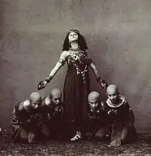 Sofia Fedorova as the slave Hita (or Ramzé) with unidentified children in the Pas des Caryatids from Alexander Gorsky's 1905 revision for the Moscow Bolshoi Theatre, 1909