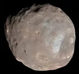 Image 14Phobos (moon)Photo credit: Mars Reconnaissance OrbiterPhobos, the larger and closer of the two moons of Mars, as seen from about 6,000 kilometres (3,700 mi) away. A small, irregularly shaped object, Phobos orbits about 9,377 km (5,827 mi) from the center of Mars, closer to its primary than any other planetary moon. The illuminated part of Phobos seen in the images is about 21 km (13 mi) across. The most prominent feature in the images is the large crater Stickney in the lower right. With a diameter of 9 km (5.6 mi), it is the largest feature on Phobos.More selected pictures
