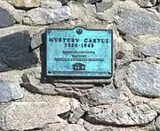 Historic Mystery Castle plaque. Mystery Castle is located at 800 E. Mineral Road, in the city of Phoenix, in the foothills of South Mountain Park. It was built in the 1930s by Boyce Luther Gulley. The castle is designated as a Phoenix Point of Pride.