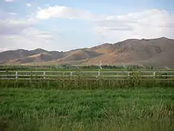 Hills, mountains, and irrigated fields of Picabo