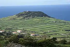 Pico Matias Simão an ancient volcanic spatter cone located near the coast of Altares