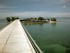 Approaching Pigeon Key post-highway conversion.  Guardrails are made up of rails from the former railroad.