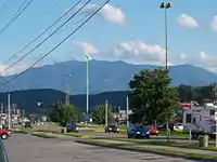 Pigeon Forge with Mount Le Conte in the background.