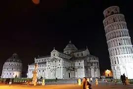 Pisa Tower with cathedral and baptistry at night