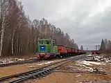 Locomotive TU4-2170 with freight train