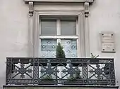 Cast iron balcony decorated with meanders in Paris