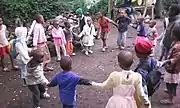 8 Tanzanian children in a group game