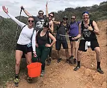 Plogging group picking up litter and trash