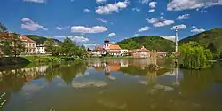 View of Nedvědice across a pond