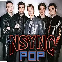 NSYNC posing in front of a gray background. The group's name and song title are positioned in front of them.