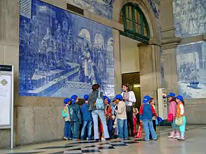 Azulejo panel in the São Bento railway station in Porto, Portugal.