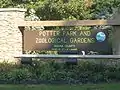 Potter Park and Zoological Gardens sign along the entrance drive to the zoo