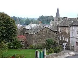 The church and surrounding buildings in Prades-Salars