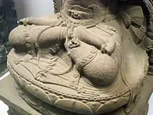 Detail of Prajñāpāramitā statue (clothing), resemble jlamprang batik motifs.