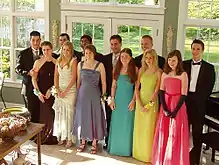 A typical pre-prom gathering, with various shoulder strap styles