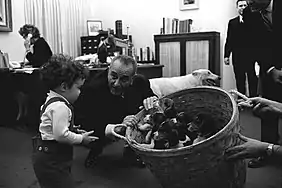 Image 23President Lyndon B. Johnson with a basket of puppies in 1966 (from Puppy)