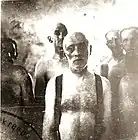 Prisoners in Chełmno (northern Poland), before getting into the gas van.