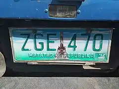 Private vehicle license plate produced in 2006. Note the Jose Rizal Monument which replaced the white paint.