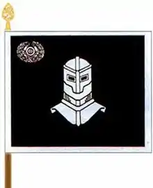 Colour of the Armoured Brigade features the black and silver colours of Finnish armoured troops while the main emblem is a cuirassier helmet symbolizing armoured force.