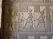 Ptolemy XII before Isis and Osiris, at the Hathor Temple, Dendera.