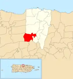 Location of Pugnado Adentro within the municipality of Vega Baja shown in red