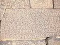 Greek inscription on basalt block in secondary use