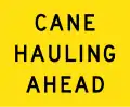 (W5-Q07) Cane Hauling Ahead (This flag is used with the guide sign sugar cane area.) (Used in Queensland)