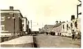 East down 11th Avenue from Scarth Street, 1906. On the right is the Post Office under construction