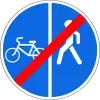 The end of the pedestrian and bicycle lane with traffic separation