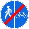 The end of the pedestrian and bicycle lane with traffic separation