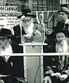 Grand Rabbi Yerucham Leiner of Radzin speaking