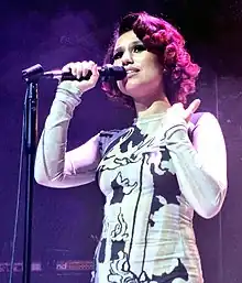 Raye performing in 2023