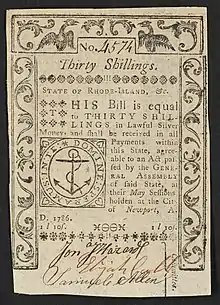 A 1786 Rhode Island bank note featuring the Rhode Island seal with the inscription: "STATE OF RHODE-ISLAND, &c. THIS Bill is equal to THIRTY SHILLINGS in Lawful Silver Money, and shall be received in all Payments within this State, agreeable to an Act passed by the GENERAL ASSEMBLY of said State, at their May Sessions, holden at the City of Newport, A. D. 1786. 1l 10s." ; "Committee" is written vertically, to the right of the signatures. ; Within seal: "DOMINE: SPERAMUS: IN: TE:" ; Verso: "One Pound Ten. Printed by SOUTHWICK and BARBER. Death to Counterfeit."