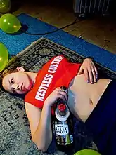 Image 92Model wearing a midriff shirt, a silver necklace, low ponytail and straight-leg leggings, 1999. (from 1990s in fashion)