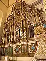 An old retablo inside the San Ildefonso Church
