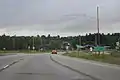 Looking east at the sign for Rhinelander on US 8