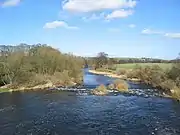 River Wharfe east from Harewood Bridge.mw-parser-output .geo-default,.mw-parser-output .geo-dms,.mw-parser-output .geo-dec{display:inline}.mw-parser-output .geo-nondefault,.mw-parser-output .geo-multi-punct{display:none}.mw-parser-output .longitude,.mw-parser-output .latitude{white-space:nowrap}53°54′49.31″N 1°31′18.97″W﻿ / ﻿53.9136972°N 1.5219361°W﻿ / 53.9136972; -1.5219361