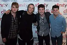 Rixton at the Click 98.9 New Artist Showcase, August 2014. From left to right: Danny Wilkin, Lewi Morgan, Jake Roche and Charley Bagnall.