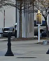 A plaque entitled "The Bus Stop" at Dexter Ave. and Montgomery St.—the place Rosa Parks boarded the bus—pays tribute to her and the success of the Montgomery bus boycott.