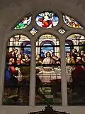 Stained glass window depicting the Last Supper