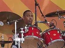 Russell Batiste Jr. playing at the New Orleans Jazz & Heritage Festival, 2008