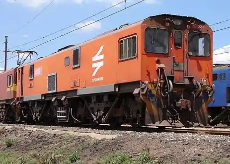 No. 10-021 in Spoornet orange livery at Pyramid South, Pretoria, 6 October 2009