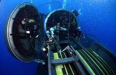 Navy divers and special operators attached to SEAL Delivery Team 2, perform SDV operations with USS Florida