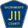 County Road J11 marker