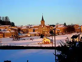 The church and surrounding buildings in winter
