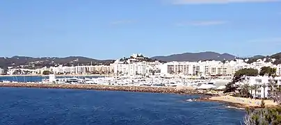 Port and town of Santa Eulària des Riu from NE.