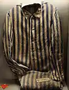 Sachsenhausen detainee's red political enemy triangle atop a yellow Jew triangle (lower left)