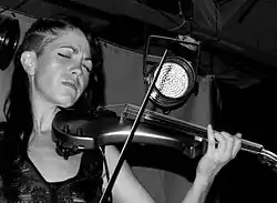 Sadie Anderson performing with the group in 2010